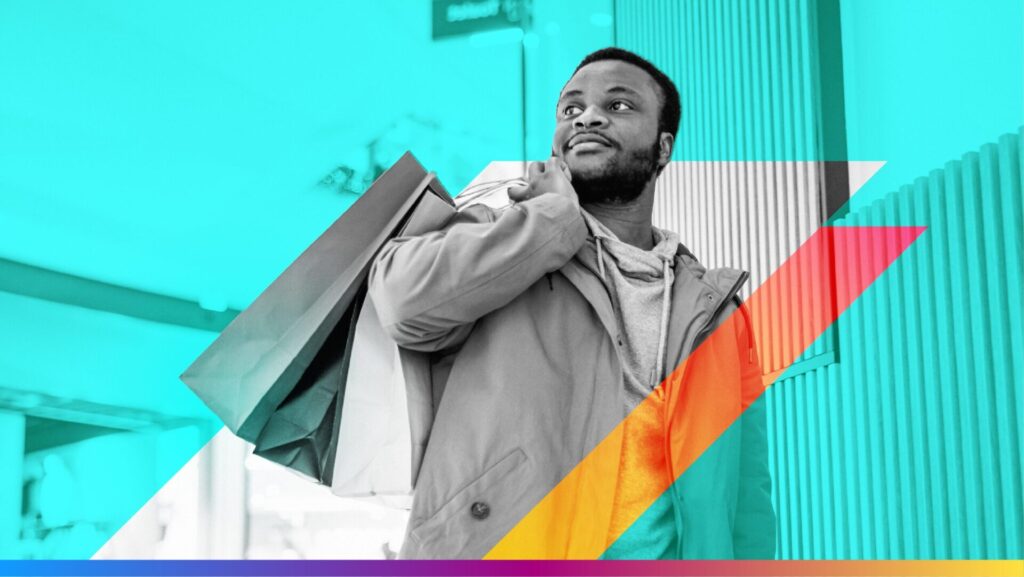 Person holding shopping bag looking off